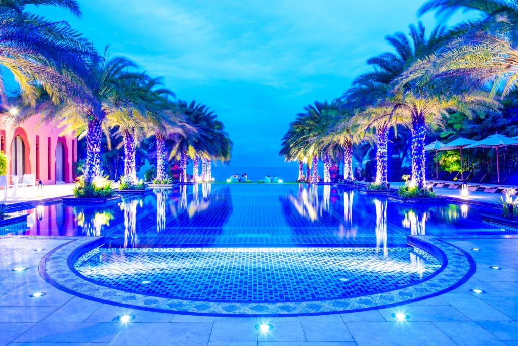 Luxury hotel swimming pool at night